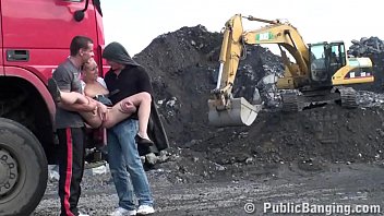 A Very Cute Blonde Young Lady Is Fucked In Public Threesome At A Construction Site