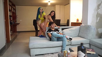 Man Watches A Soccer Game With Two Girls Licking Pussy Next To Him