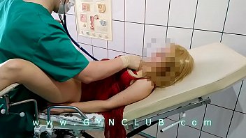 Woman In Red Dress On Gyno Exam